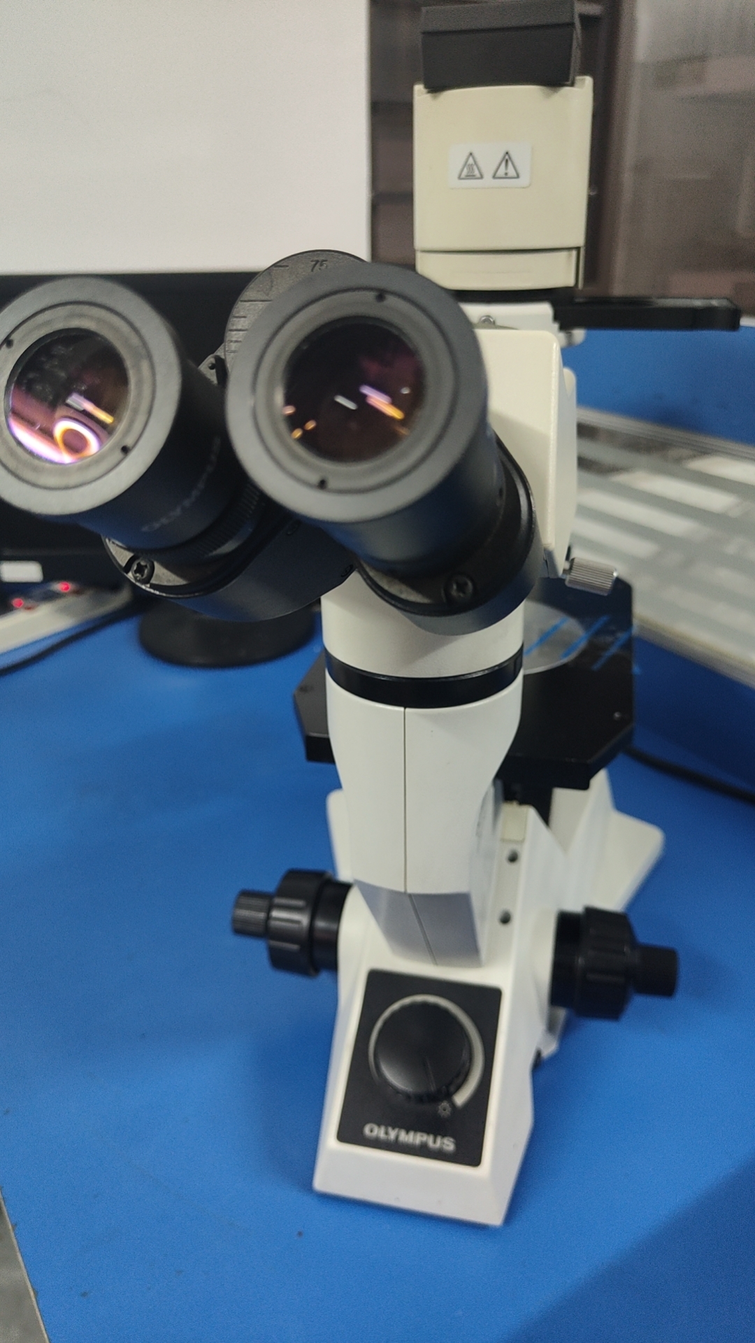 永新光学获得发明专利授权：“一种用于金相显微镜的50倍物镜”